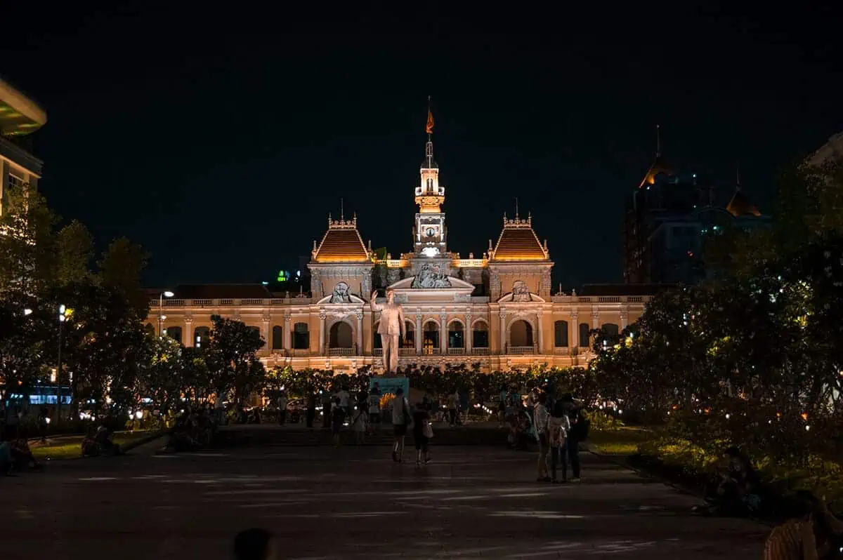 3 Week Vietnam Itinerary: BEST North To South Route 53 Saigon Central Post Office lit up at night, a stunning architectural highlight for a Vietnam itinerary.