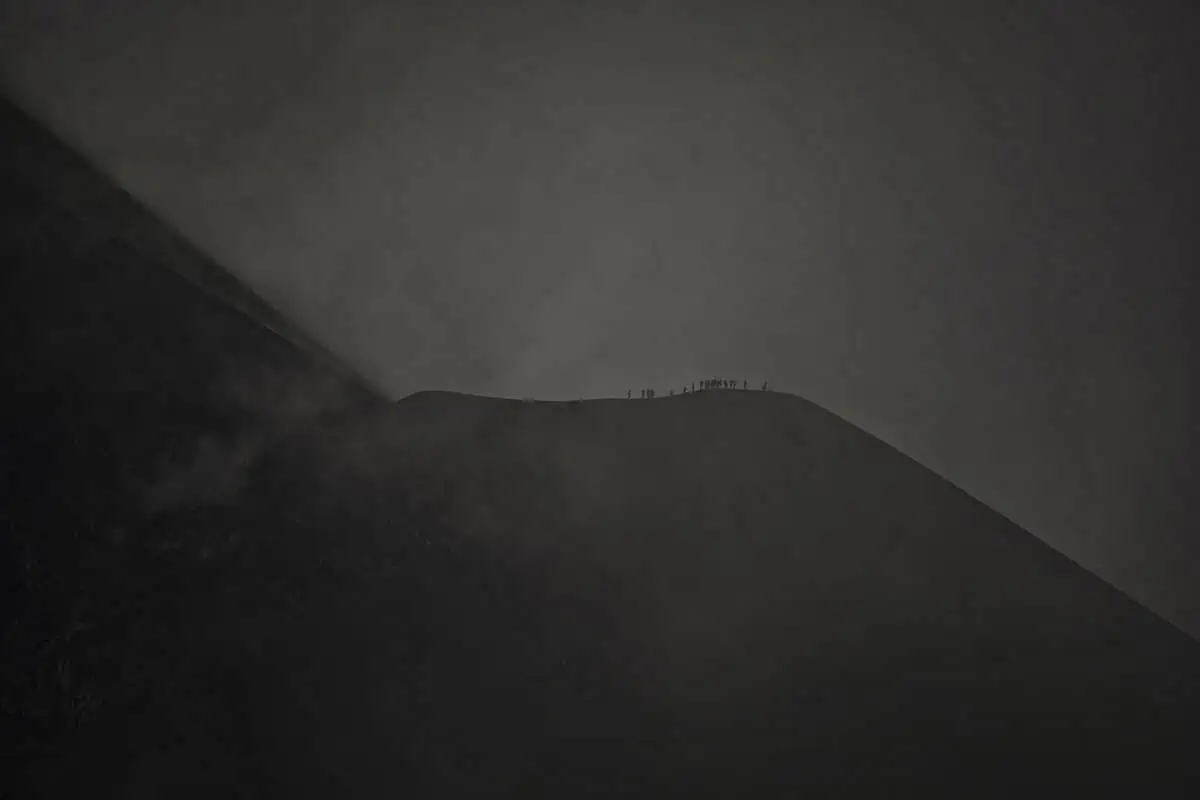 Acatenango Volcano Hike Difficulty: BEST GUIDE (2025) 15 hikers on the fuego saddle covered in cloud