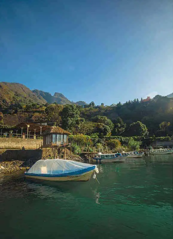 Antigua To Lake Atitlan: By Chicken Bus, Shuttle Or Taxi 15 boats outside of free cerveza hostel in santa cruz