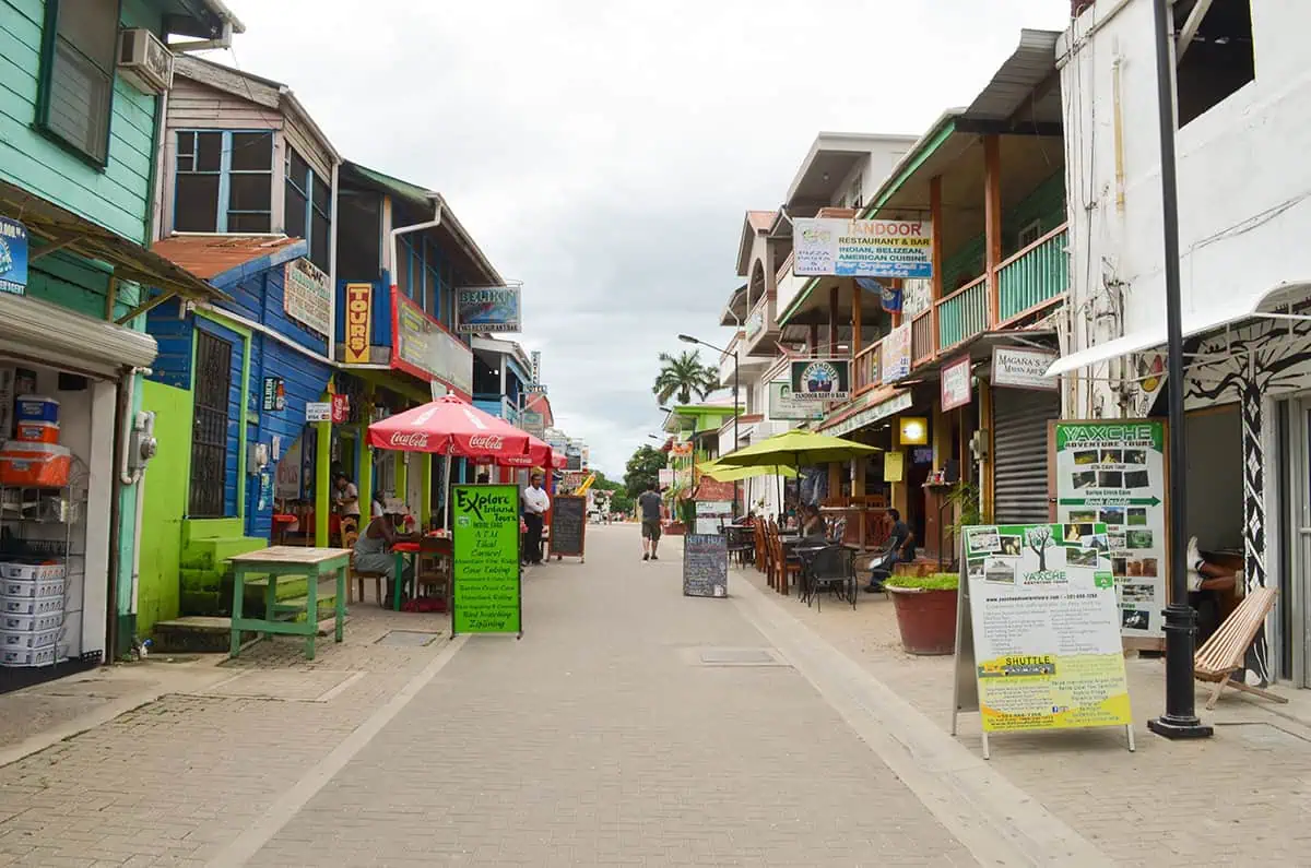 Belize Airport To San Ignacio: BEST Ways To Travel 8 Vibrant pedestrian street in San Ignacio lined with colorful buildings, eclectic shops, and outdoor restaurants