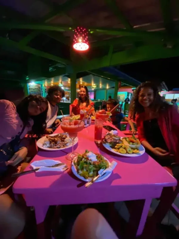 a social dinner at anda di hows hostel in palencia belize