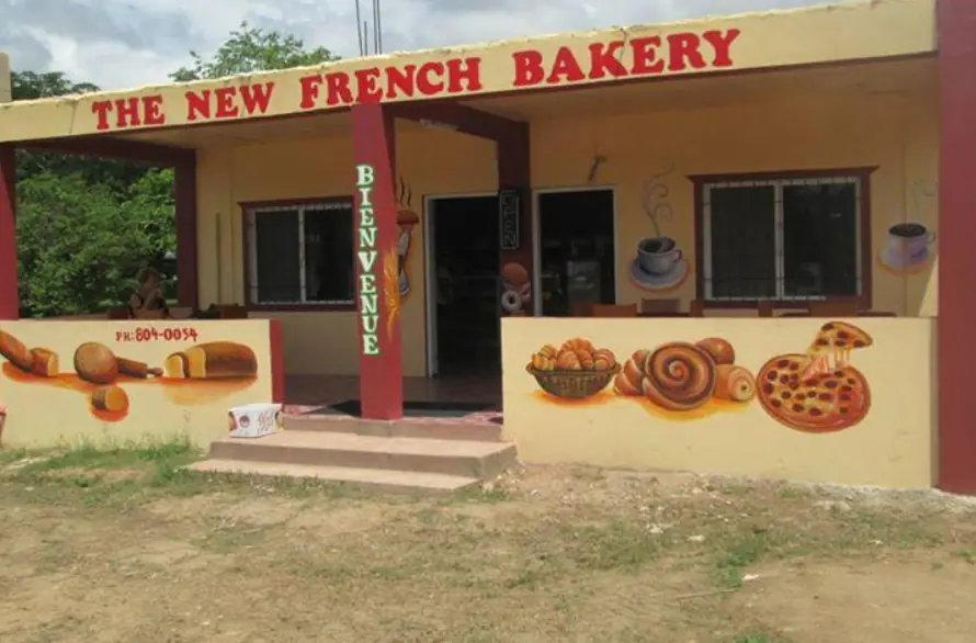 12 Best Restaurants In San Ignacio: Top Eats For Visitors 7 The New French Bakery in San Ignacio, its storefront painted with colorful depictions of baked goods, welcoming visitors to enjoy fresh pastries.