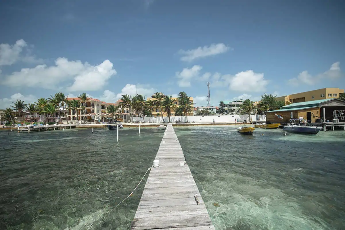41 Best Things To Do In Ambergris Caye For The Ultimate Holiday 30 Long wooden pier stretching into the azure waters off Ambergris Caye, offering a gateway to endless aquatic adventures.