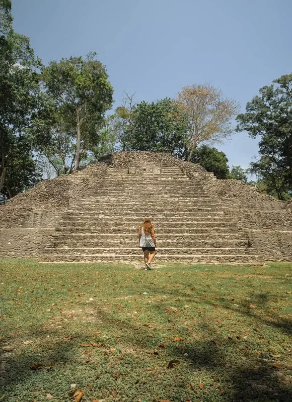 Cahal Pech Mayan Ruins In San Ignacio: A Hidden Gem Away from the Crowds 6 tash amy walking towards the ruins at cahal pech in san ignacio