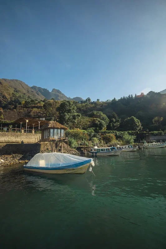 Can You Swim In Lake Atitlan Guatemala? The Water Quality, Sicknesses, & Sewage 5 looking over the lake atitlan to free cerveza hostel