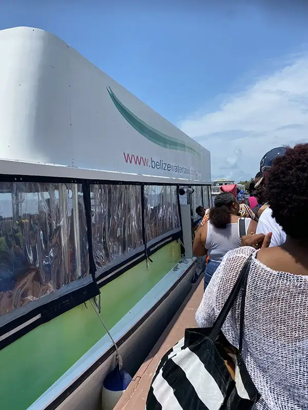 Passengers waiting to board the Belize Water Taxi at the dock in Chetumal.

