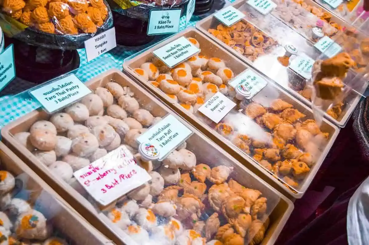 Chiang Mai Sunday Night Market: BEST Tips & Guide (2025) 24 Array of local sweets and desserts enticing visitors