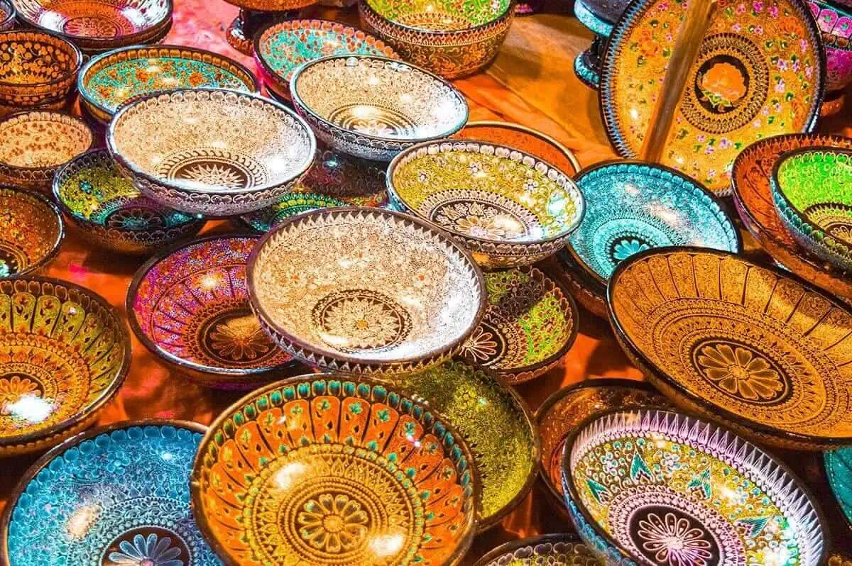 Chiang Mai Sunday Night Market: BEST Tips & Guide (2025) 23 brightly colored decorated bowls with intricate designs on display at the sunday walking street in chiang mai