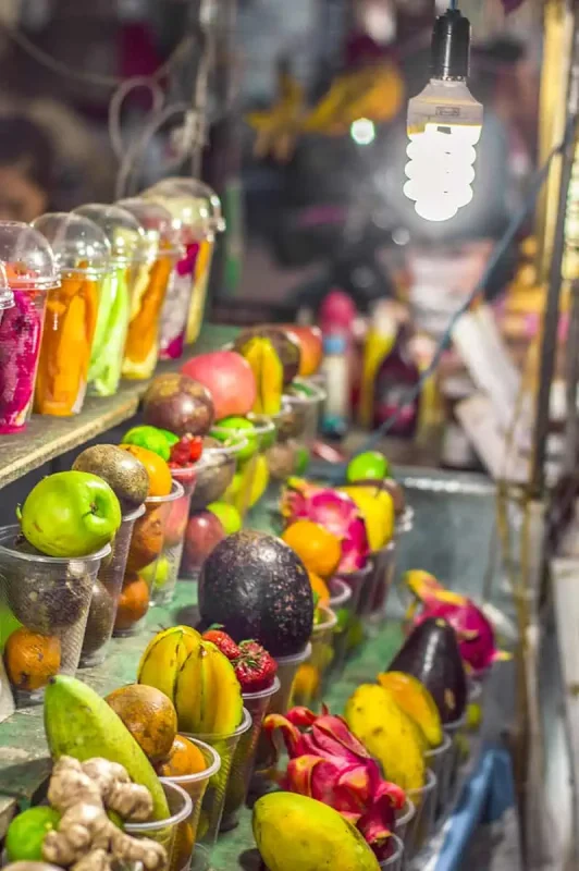 Chiang Mai To Luang Prabang: All You Need To Know 2025 25 delicious glasses of fruit waiting to be made into smoothies at the luang prabang night market