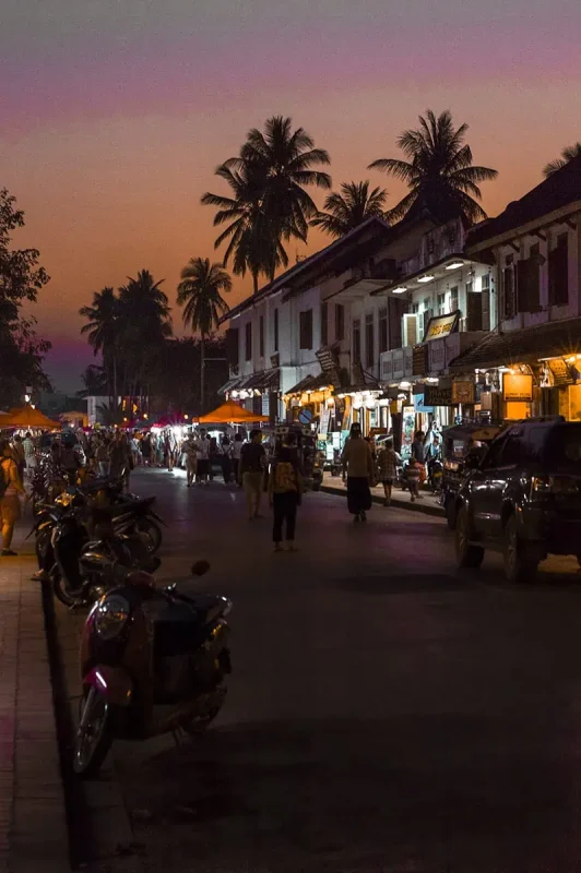 Chiang Mai To Luang Prabang: All You Need To Know 2025 26 sunset down the main walking street in luang prabang