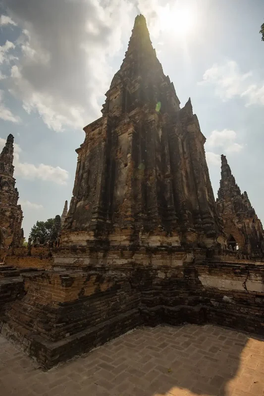 Ayutthaya Day Trip From Bangkok: BEST Guide (2025) 15 Wat Chai Watthanaram sun streak shining through temple