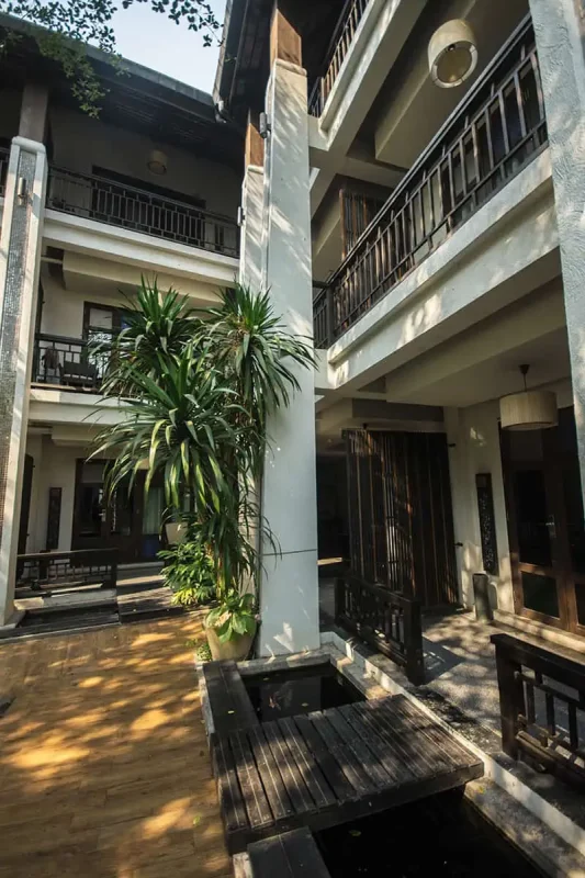 21 Best Hostels In Chiang Mai: Find Your Budget Stay 2025 15 walking around some of the balcony rooms at de lanna hotel