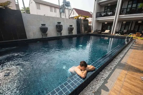 hanging pool side at one of the best hostels in chiang mai