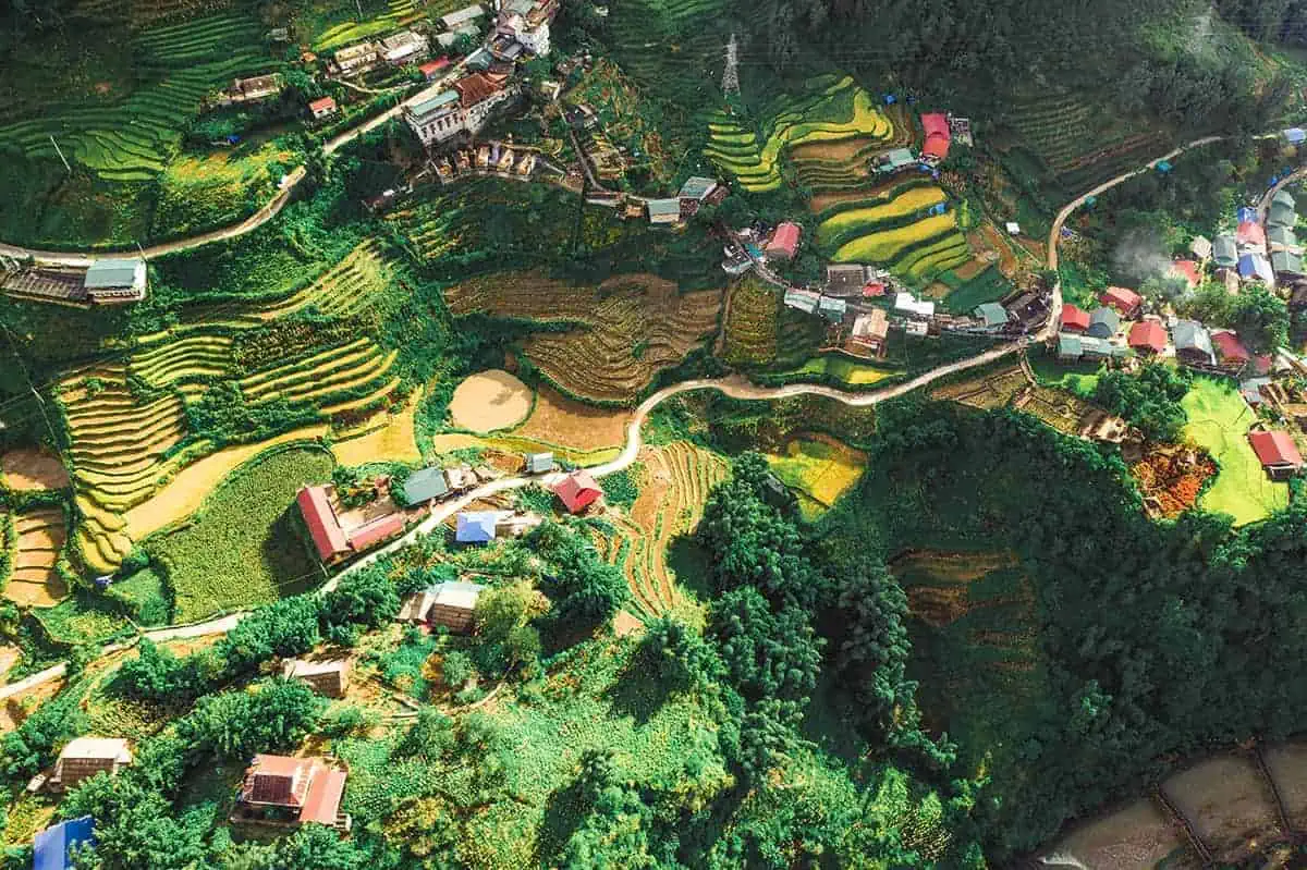 Hanoi To Sapa: Travel By Train, Bus, Or Taxi (2025) 4 drone shot over the rice terraces in sapa