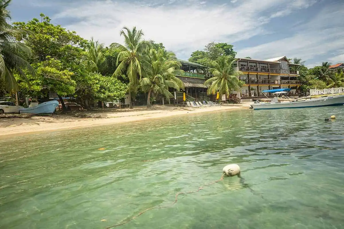 Honduras vs Belize: Which Is Best For Travelers? 13 enjoying life relaxing on the fantastic beaches in roatan honduras
