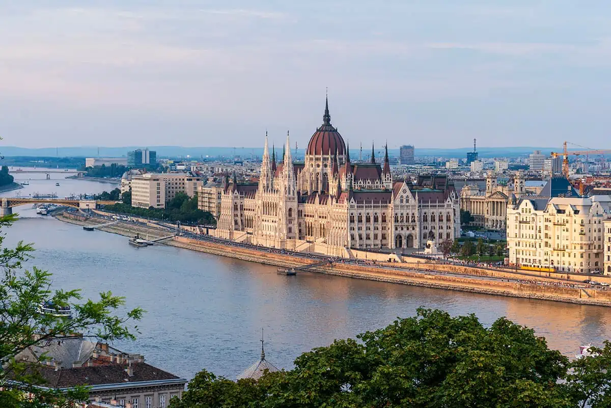 22+ Cheapest Countries To Backpack In The World! (2025) 30 A view of the hungarian parliament building and the danube river.