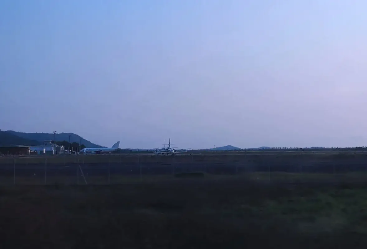 Is Sihanoukville Worth Visiting In 2025? 9 driving past sihanoukville airport at dusk