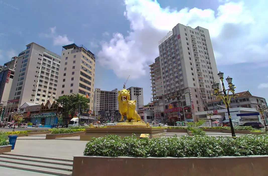 Is Sihanoukville Worth Visiting In 2025? 31 what the famous lion round a bout looks like nowdays which large apartment buildings in the background