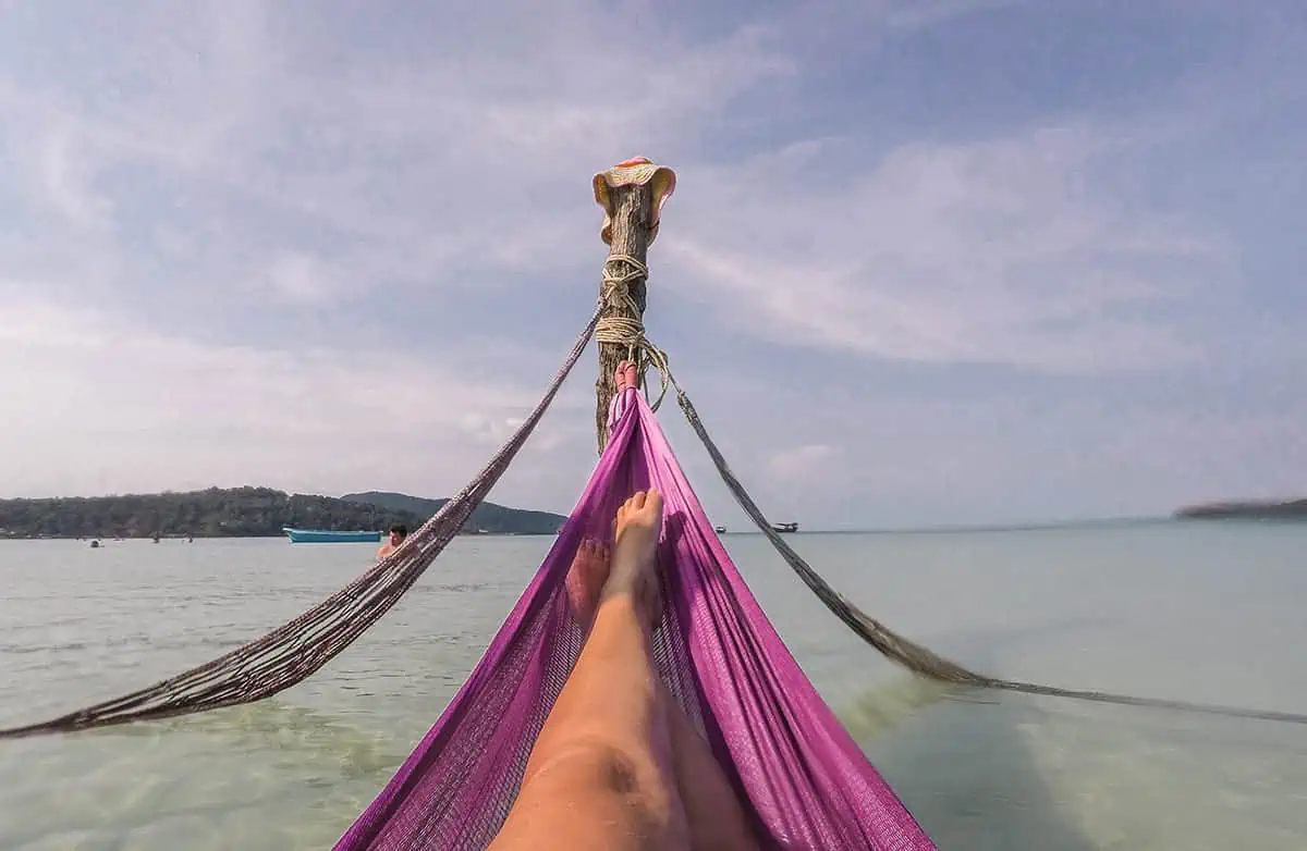 Koh Rong Or Koh Rong Samloem: Which Is BEST (2025) 8 enjoying hammock life at saracen bay on koh rong samloem