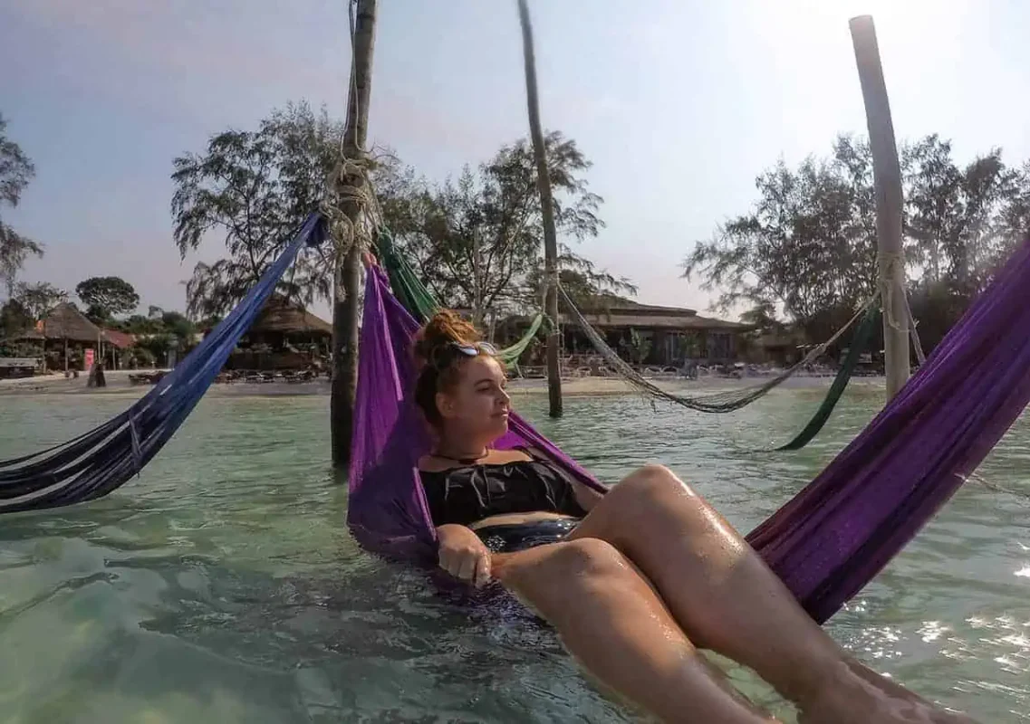 Koh Rong Or Koh Rong Samloem: Which Is BEST (2025) 23 relaxing on the hammocks at saracen bay in koh rong samloem