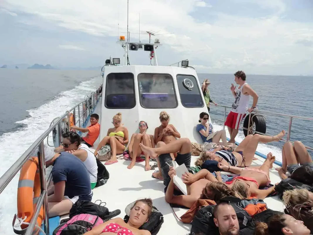 Krabi To Koh Phi Phi: The Best & Easiest Way To Travel (2025) 5 travelers relaxing on the ferry to koh phi phi