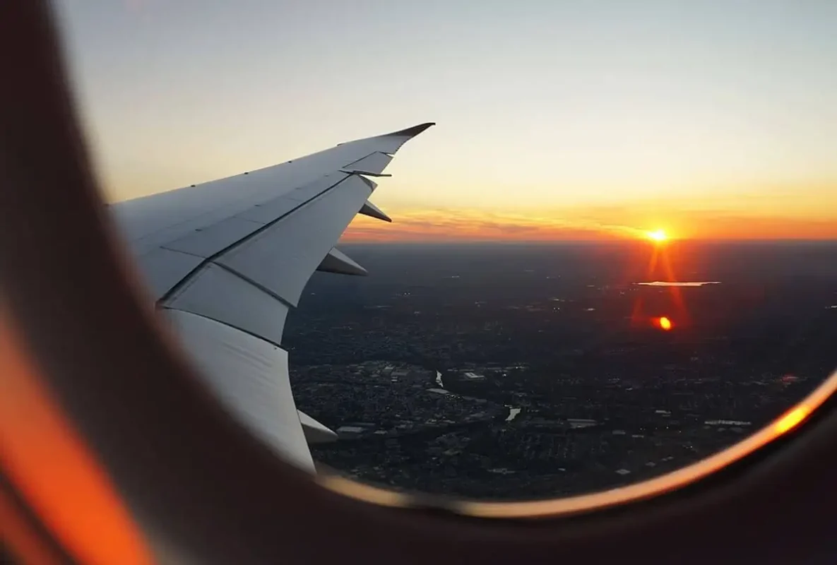 Luang Prabang To Vang Vieng: Train, Bus Or Shuttle? 14 sunset from plane window over laos