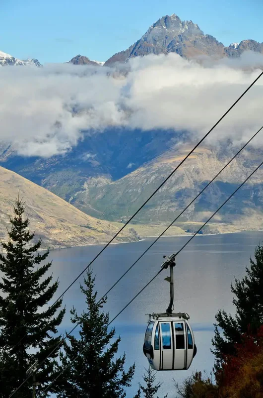 Fiordland & Milford Sound Lord Of The Rings Locations (2025) 17 A gondola above Lake Wakatipu with mountain peaks in the distance