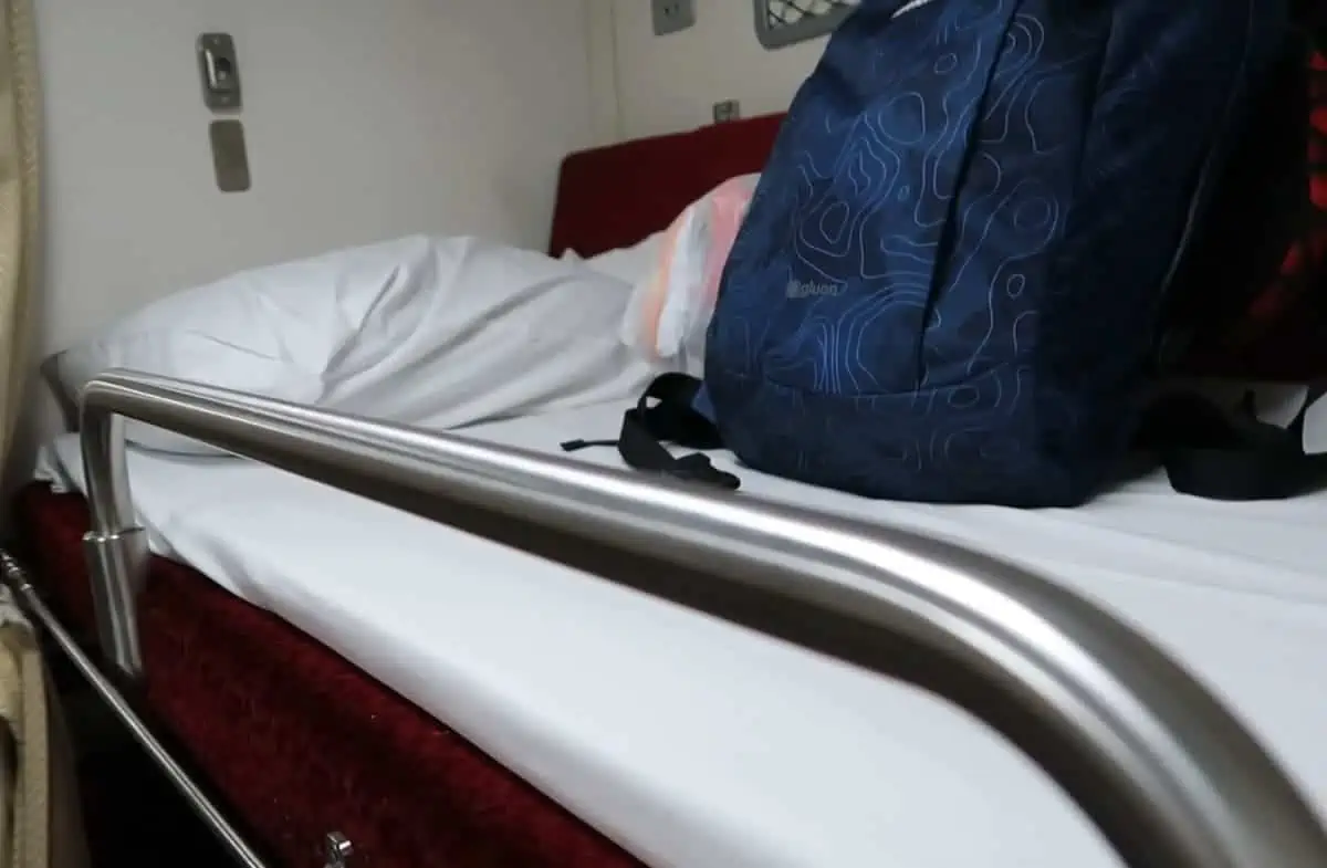 Sleeper Train Bangkok to Chiang Mai: BEST Tips 2025 12 Interior view of the sleeper train showing beds set up for the night, after conversion from seating.