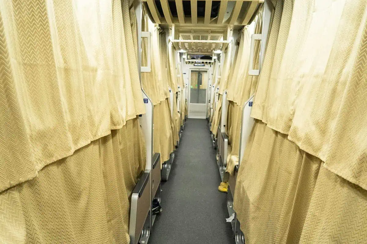 Sleeper Train Bangkok to Chiang Mai: BEST Tips 2025 8 curtains pulled shut on the overnight sleeper train from bangkok to chiang mai