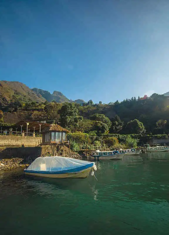 Panajachel To San Pedro & The Towns Between: How To Travel Around Lake Atitlan 44 a lancha out the front of free cerveza in santa cruz la laguna lake atitlan