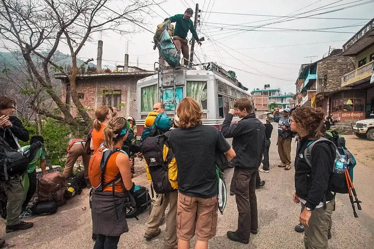 Day 1: Pokhara To Besisahar & Bahundanda: Starting The Annapurna Circuit 4 unloading bus from pokhara to besisahar
