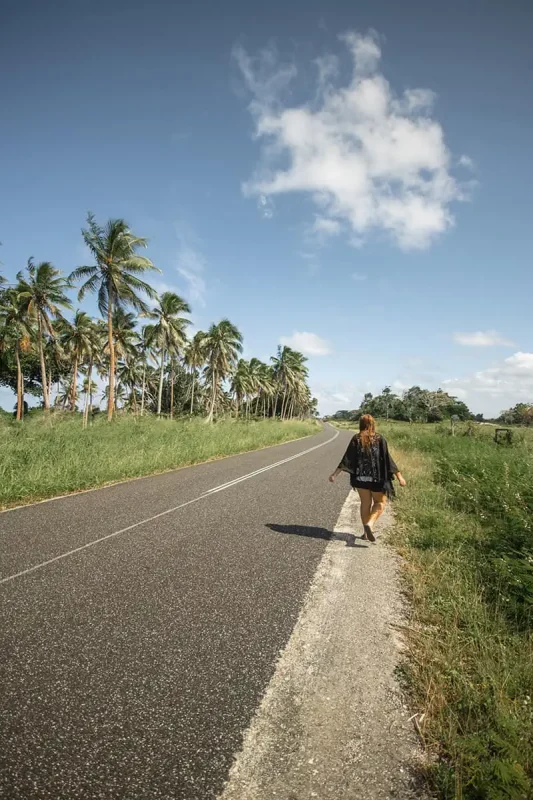 Port Vila Blue Lagoon: BEST Tips For Visiting 2025 7 tasha amy walking along the side of the road after our van broke down in port vila