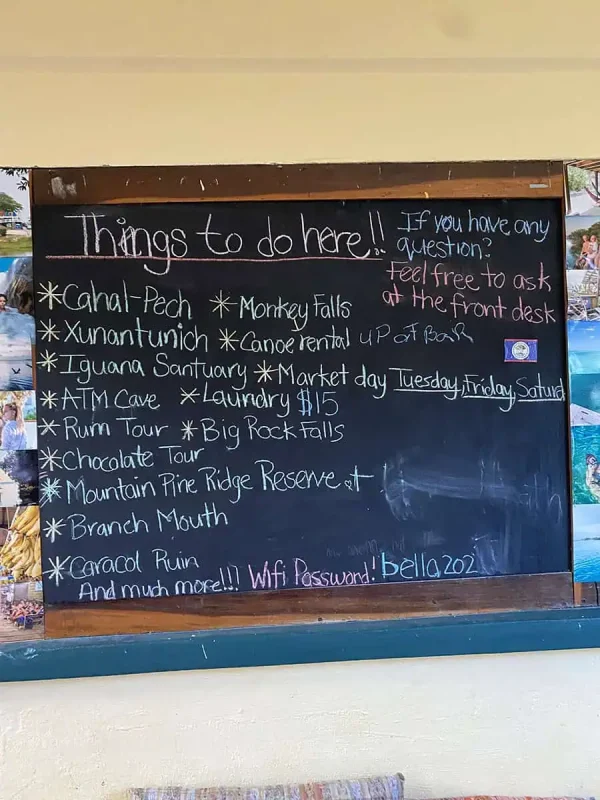 San Ignacio To Tikal & BEST Tikal Tours From San Ignacio 8 A chalkboard list of activities in San Ignacio, including tours to local attractions, showcasing the variety of adventures in the area.
