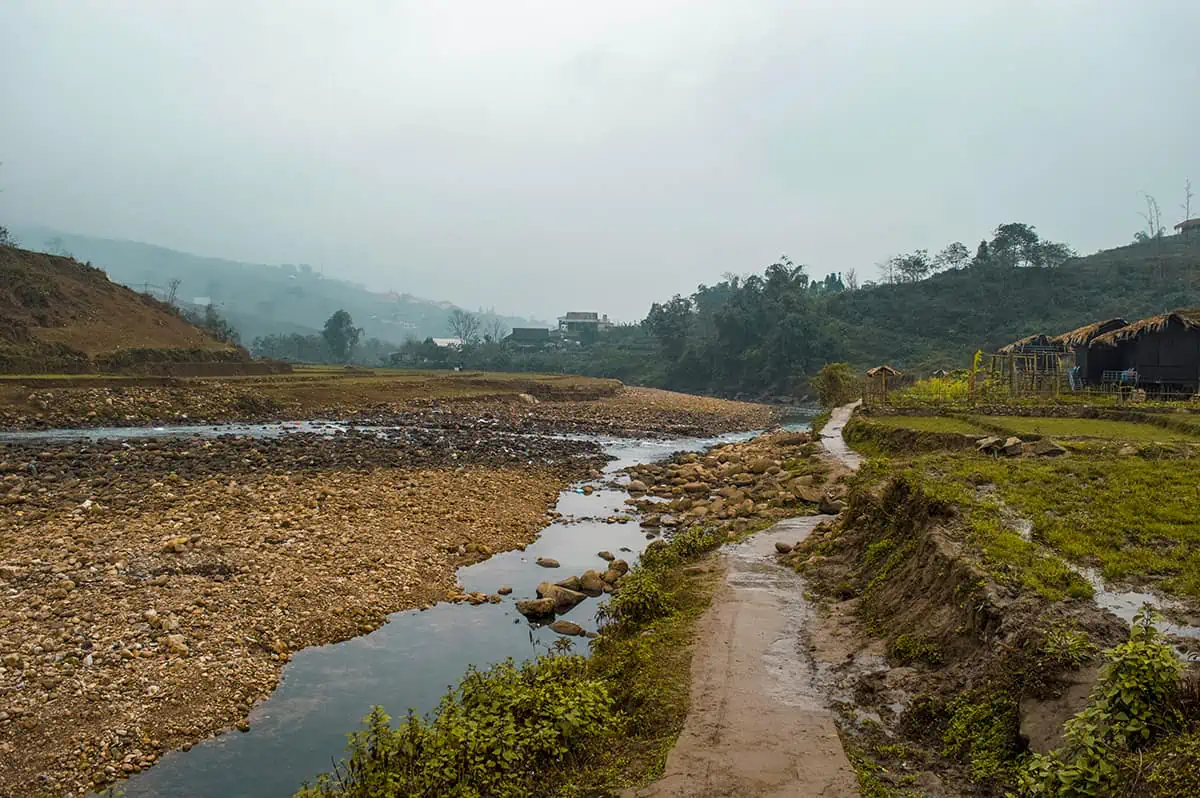 Sapa In February: All You Need To Know (2025) 13 river running next to ta van in sapa vietnam