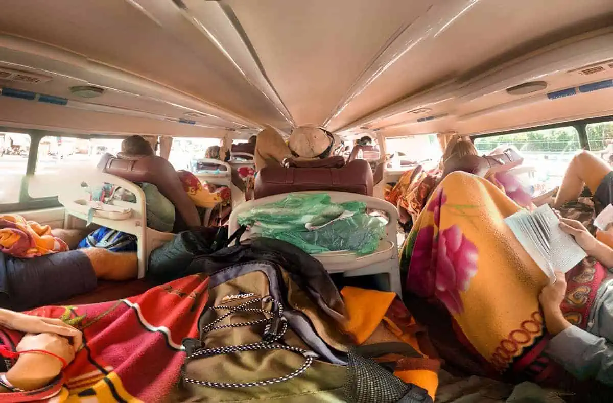 Taking A Vietnam Sleeper Bus: BEST Tips For Travelers 2025 8 Overcrowded interior of a VIP Vietnam, with sleeper bus with travelers on reclining seats
