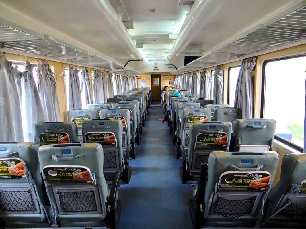 Vietnam Sleeper Train Ultimate Guide For Tourists (2025) 8 Interior view of a Vietnam overnight train carriage with soft seats