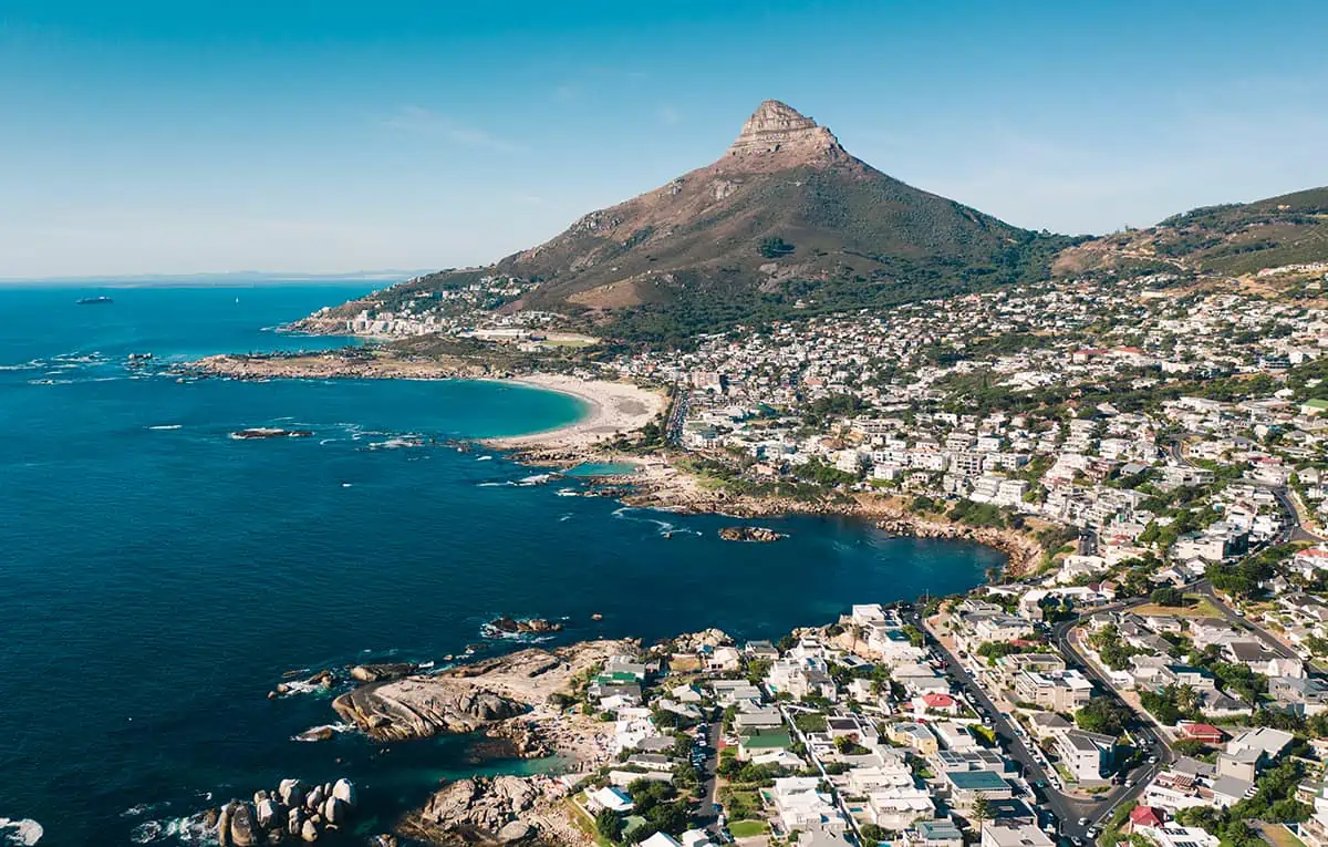 22+ Cheapest Countries To Backpack In The World! (2025) 38 An aerial view showcasing the breathtaking beauty of Cape Town and Table Mountain - a must-visit destination for backpackers seeking unforgettable experiences.