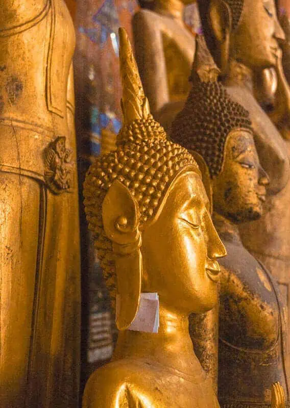 3 Days In Luang Prabang Itinerary: ULTIMATE Guide 6 golden buddhas at temple in luang prabang