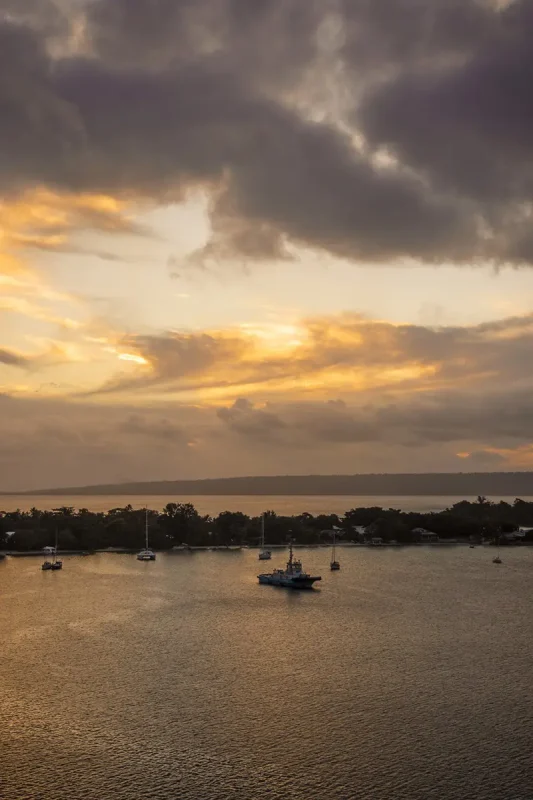 Vila Vanuatu Cruise Port: What To Know And Best Things To Do 5 orange sunset with yachts lined up at port vila