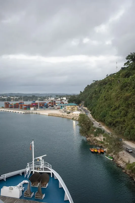 Vila Vanuatu Cruise Port: What To Know And Best Things To Do 9 the bows of the cruise ship starting to pull away from the port in port vila vanuatu