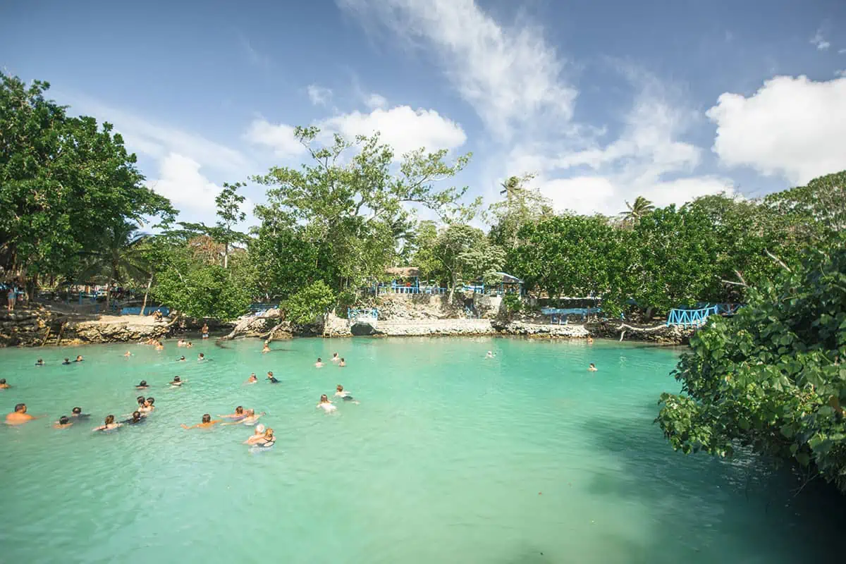 Vila Vanuatu Cruise Port: What To Know And Best Things To Do 14 tourists swimming in the blue lagoon port vila