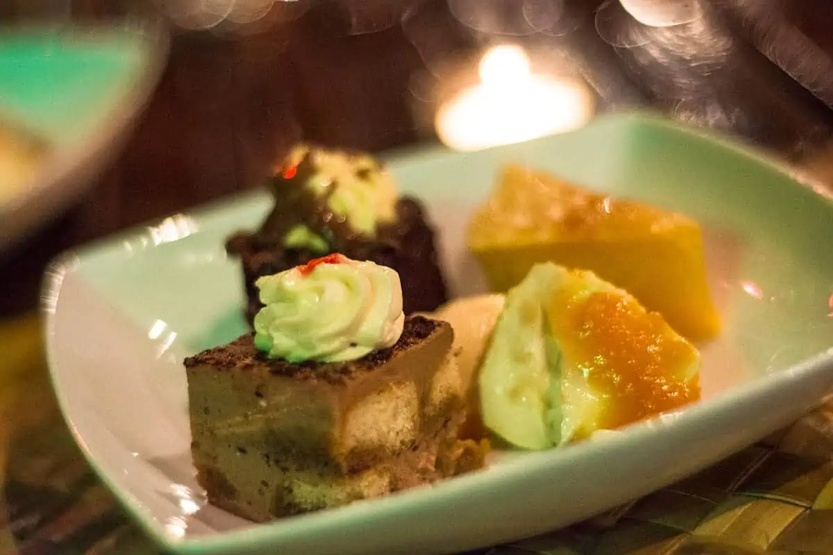 Where To Eat In Rarotonga: BEST Restaurants & Cafes 2025 26 Assorted desserts including a creamy cake and golden-baked goods, from Te Vara Nui, showcasing the variety at Rarotonga's top dining venues.