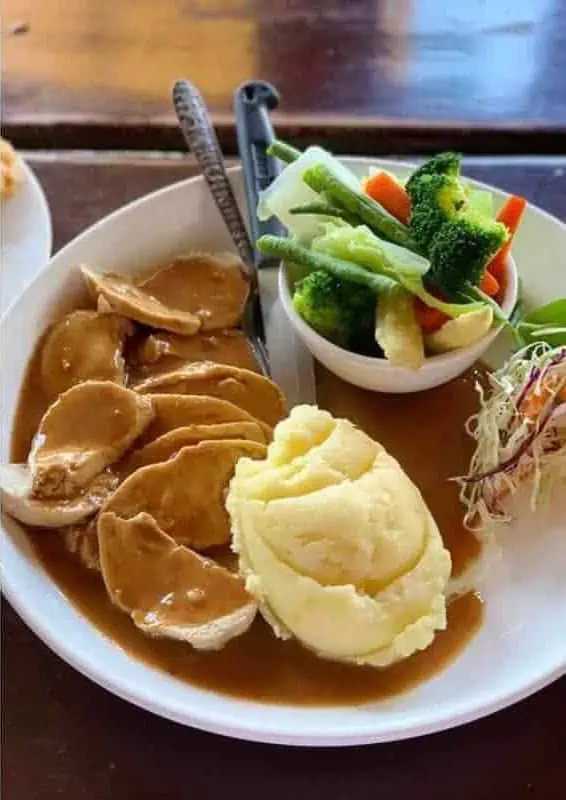 Where To Eat In Vang Vieng: BEST 11 Spots Worth Trying 13 western food from garys irish pub where to eat in vang vieng consisting of a roast with gravy
