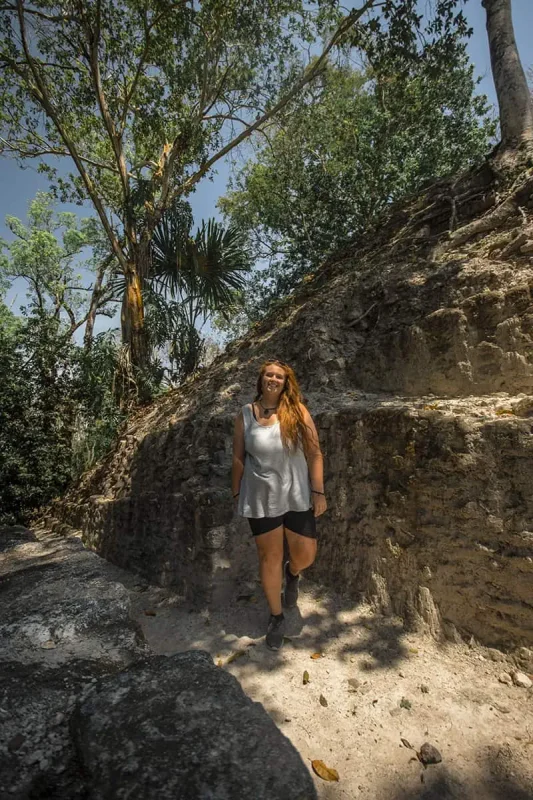 Why Visit Belize: 20 Reasons To Add It To Your Travel Bucketlist 6 enjoying some shade while exploring cahal pech mayan ruins in belize