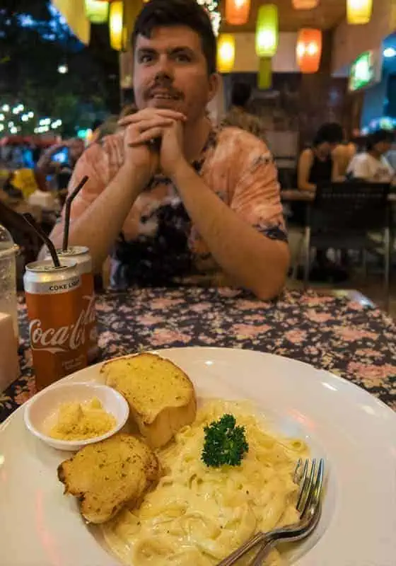 120+ Would You Rather Travel Questions For Ultimate Wanderers 13 An italian pasta meal at a restaurant in bangkok